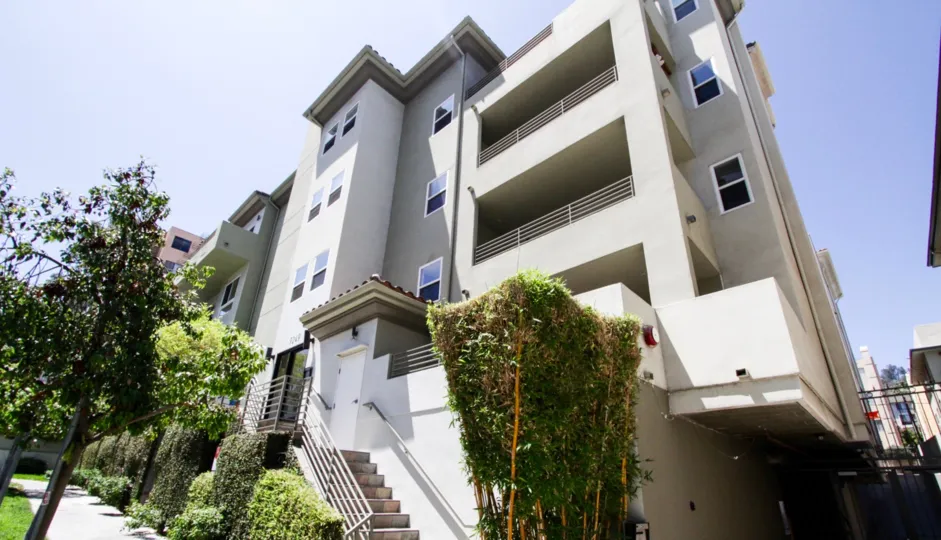 Stairs lead to the front entrance of Franklin Place