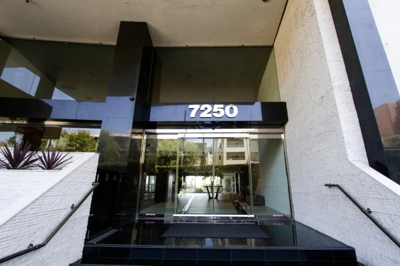 Glass doors lead to the lobby of Franklin Towers in Hollywood