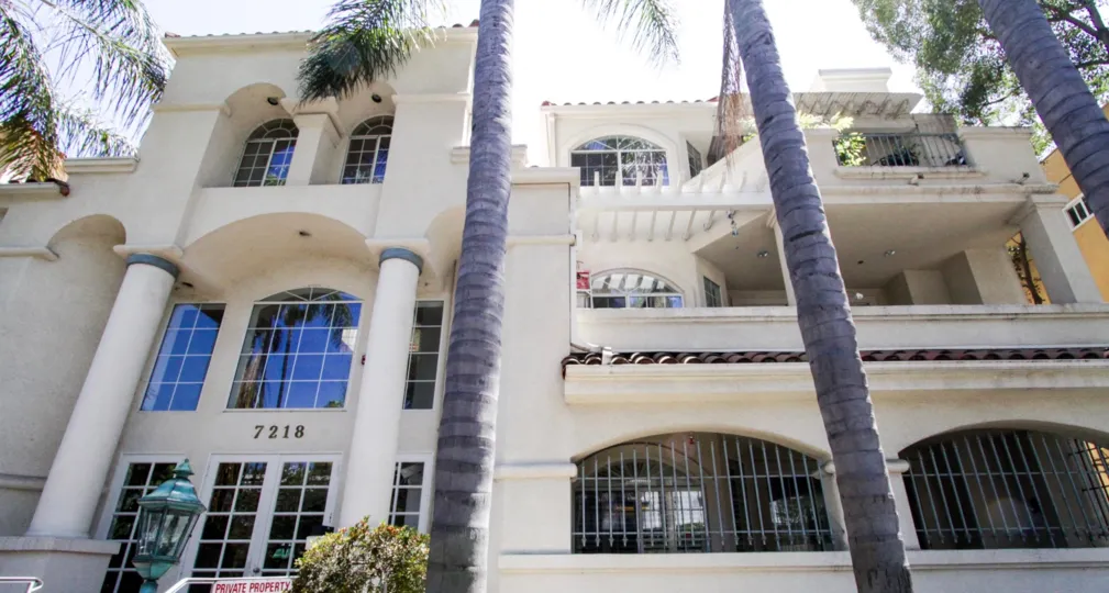 The Hillside Gardens building is multiple stories offering balconies on each level