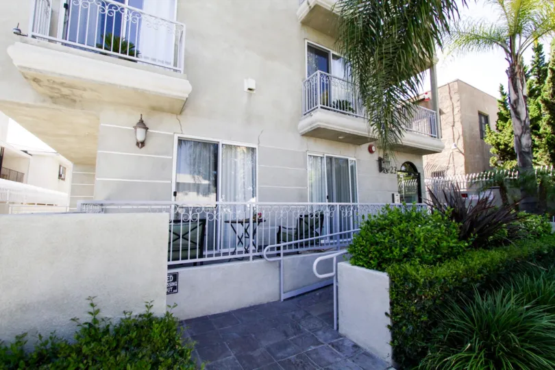 A ramp leads to the front entry of Hollywood Gate Homes