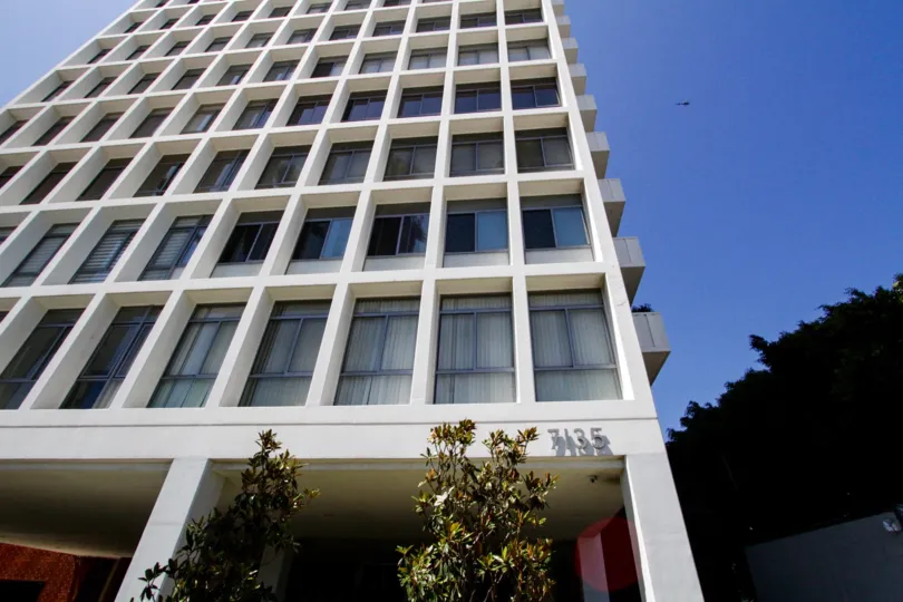 Symmetrical ascending rectangles wrap the exterior of the Hollywood Versailles Tower