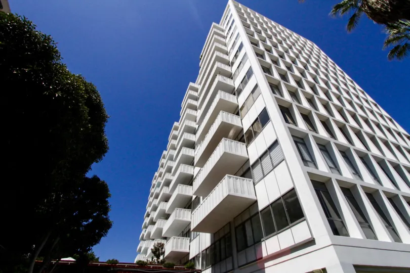 Large balconies protrude off the side of the Hollywood Versailles Tower