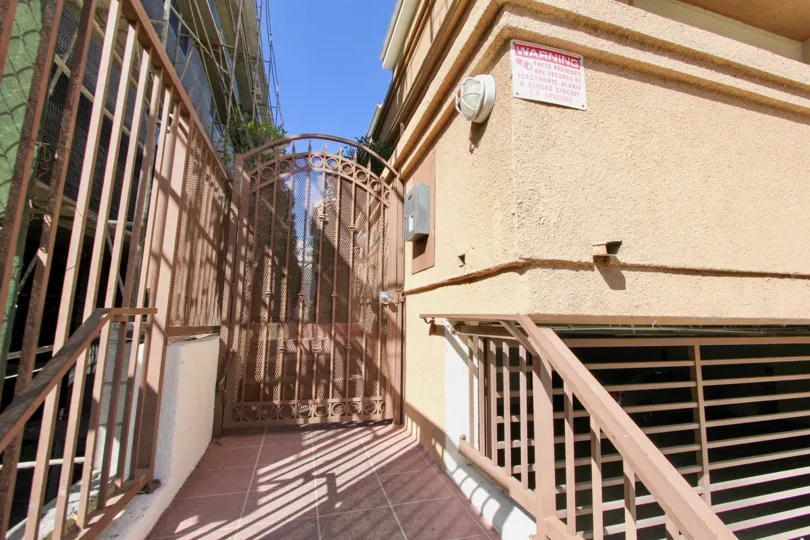 The gated entrance on the side of Hudson Terrace