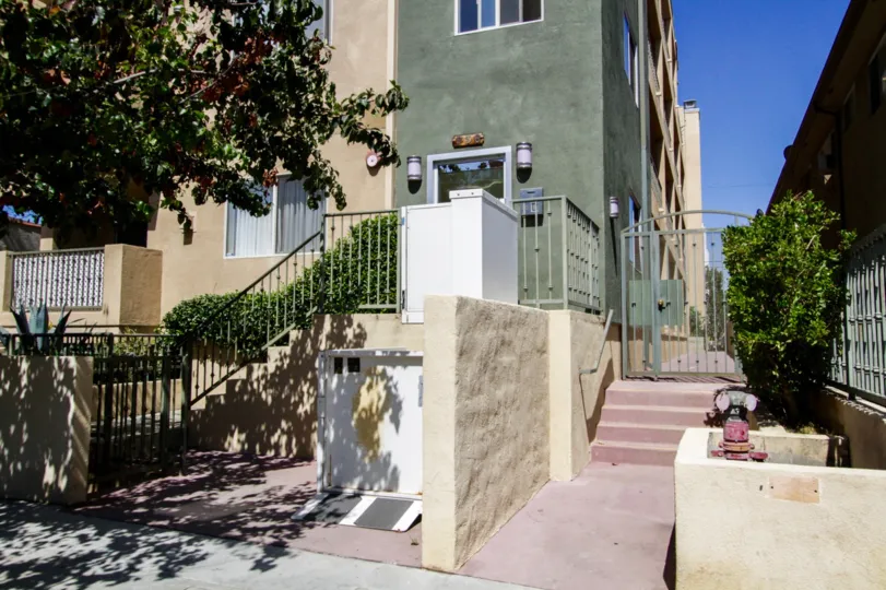 Stairs lead to the front and side entrance to Hudson Villas in Hollywood