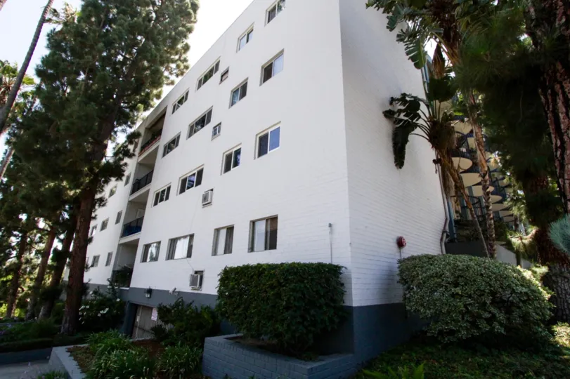 Corner view of the Sierra Terrace building shows it is mostly brick construction painted white