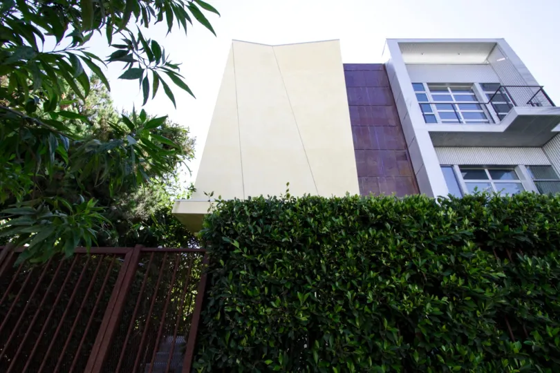 Sunset Blvd Lofts at Bronson is modern building made of stucco, metal and glass