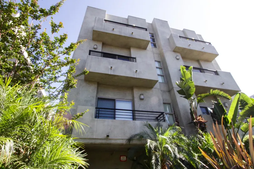 Made of concrete The Mark has smooth lines and black metal railings as an accent