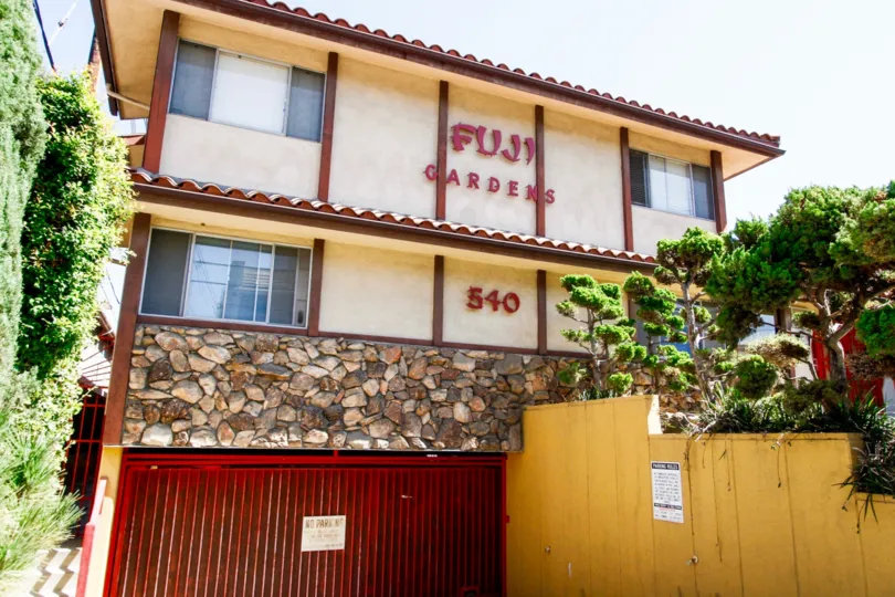 The name of the Fuji Gardens on the front of the building