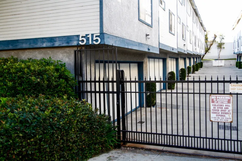 The gate into the parking area for Hazel Manor in Inglewood