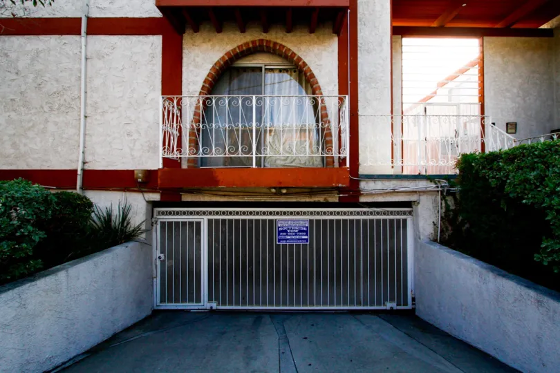 The gated entrance into La Casa Rica parking