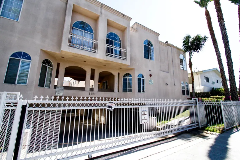 The sidewalk in front of Queen Villas