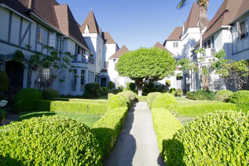 Gardens encompass the courtyard of Chateau Alpine