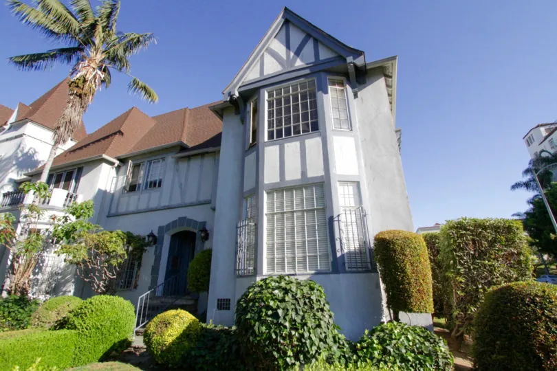 Bay windows protrude from the corners of Chateau Alpine