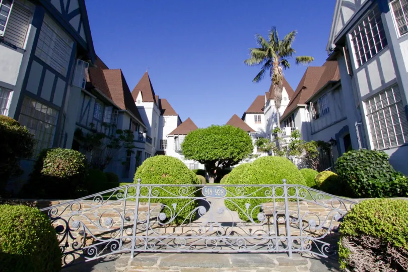 Address numbers for Chateau Alpine are displayed on a wrought iron handrail