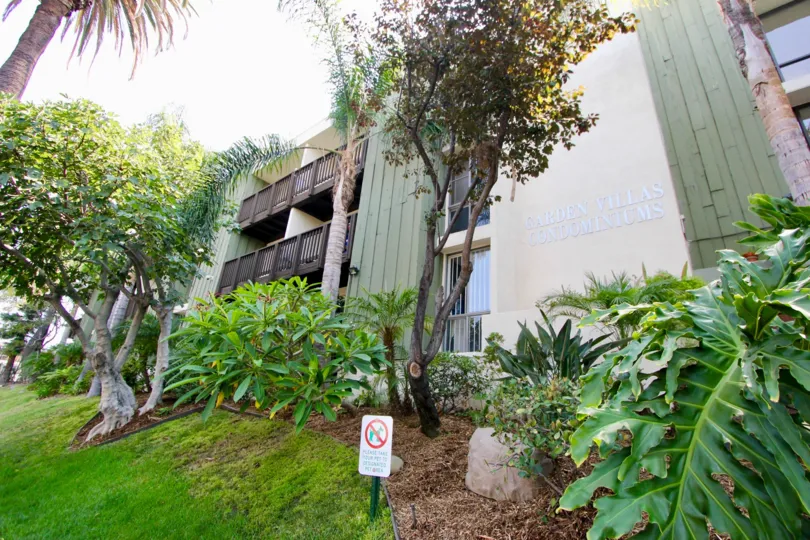 A SUNNY DAY IN THE GARDEN VILLAS. THE FRONT VIEW OF THE APARTMENTS IS ECOFRIENDLY