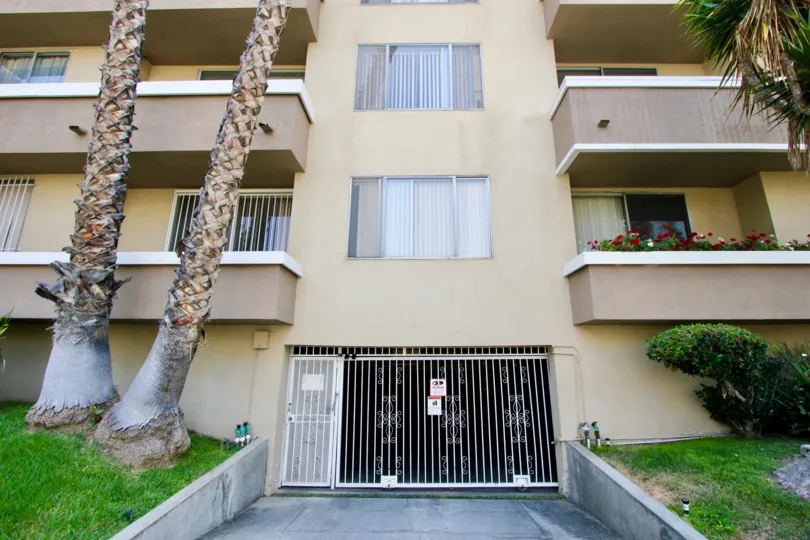 Driveway to an apartment complex during a sunny day in Koreatown, CA.