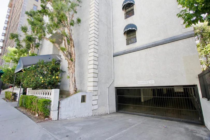 Looking at the gate of the Kenmore Manor apartments in Koreatown, California