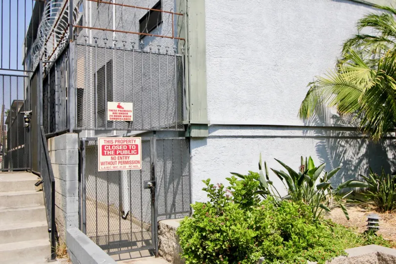 Partial view of Kingsley Crest building and gate in Koreatown, CA