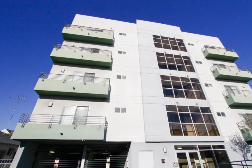 Balconies wrap around the corners of each level of the Kingsley Manor Condo building