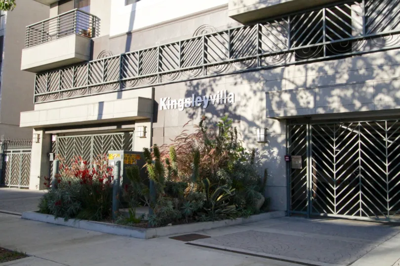 The Kingsley Villa marquee is at the center of the first floor of the building between the garage entrances