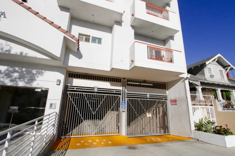 Two gates serve as access to the private parking area of Lamk Villa