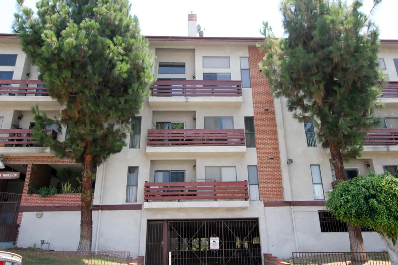 view of Lucky Mansion apartment from the middle of two Trees