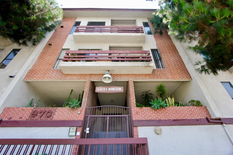 The brick apartment building of called Lucky Mansion is located in Koreatown in California.