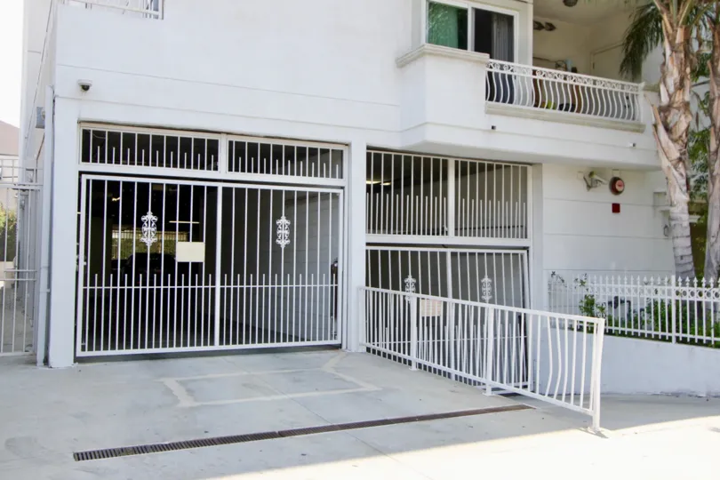 Partial view of Manhattan Villa and gates in Koreatown, CA