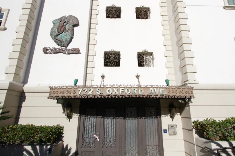 The entry doors to Oxford Square are made of metal and hammered glass