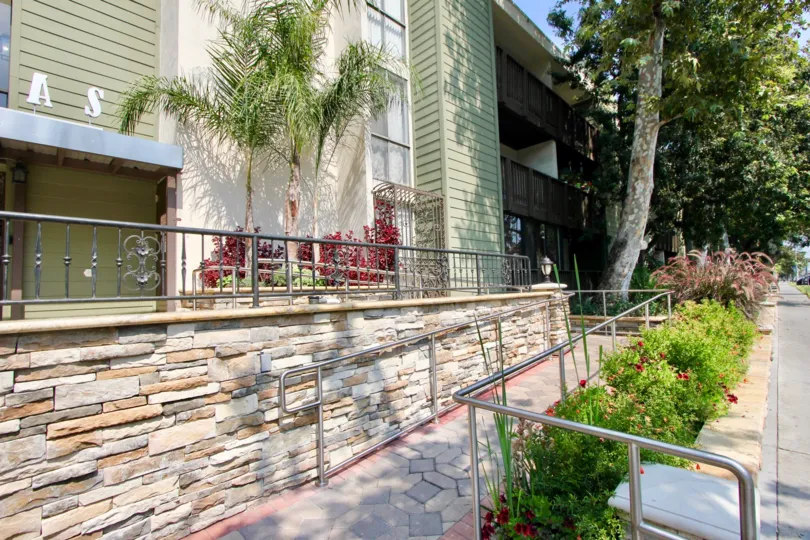 Walkway with bushes near Park Villas in Koreatown California