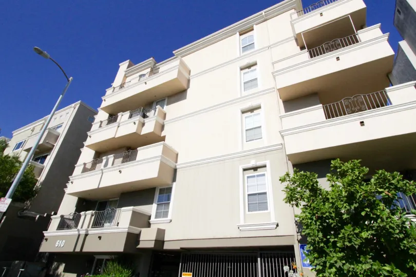 At the center of the Wilton Terrace building there is a gated parking area entrance