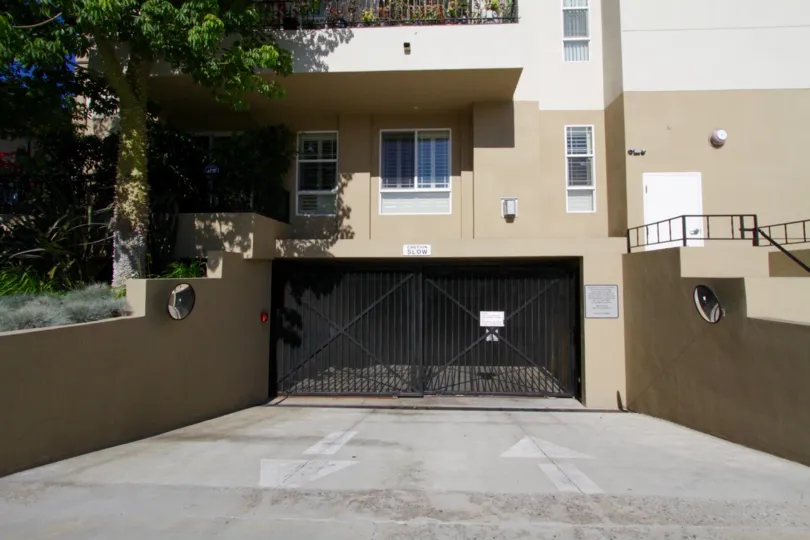Two gates lead in and out from the gated parking garage for Wilton Villas
