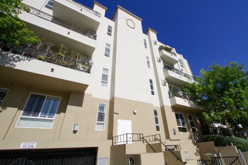 Wilton Villas is a stucco exterior two toned in tan colors