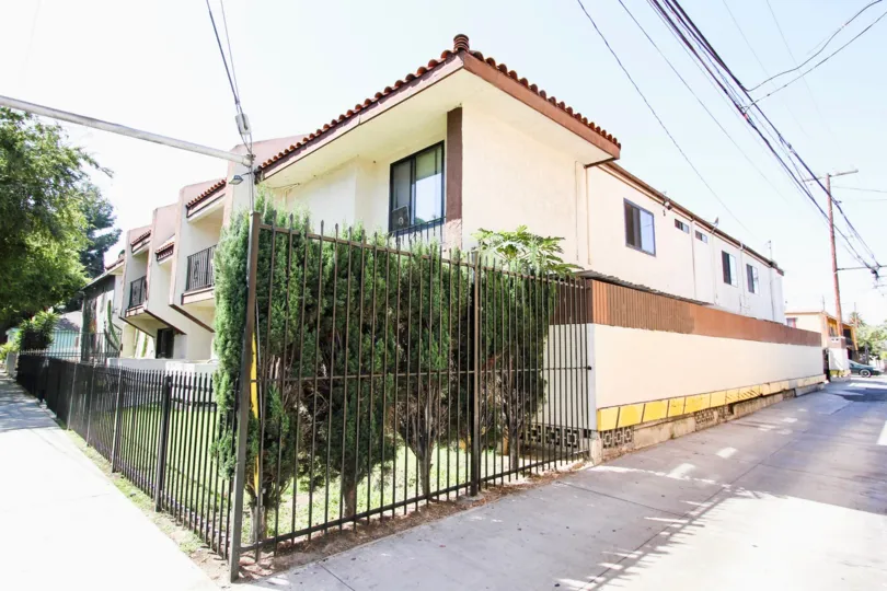 The fence around 1215 Ohio Ave in Long Beach, California