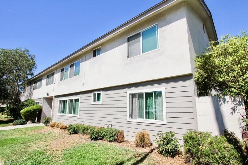The yard in front of 3045 E Theresa St