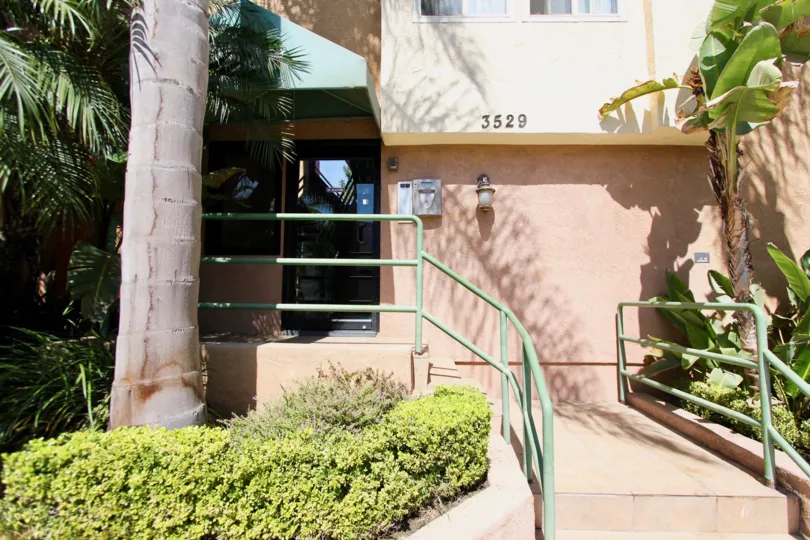 The stairs up to the entrance of 3529 E Broadway