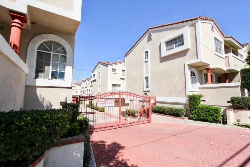 The secured gate for access to 68th St Condos
