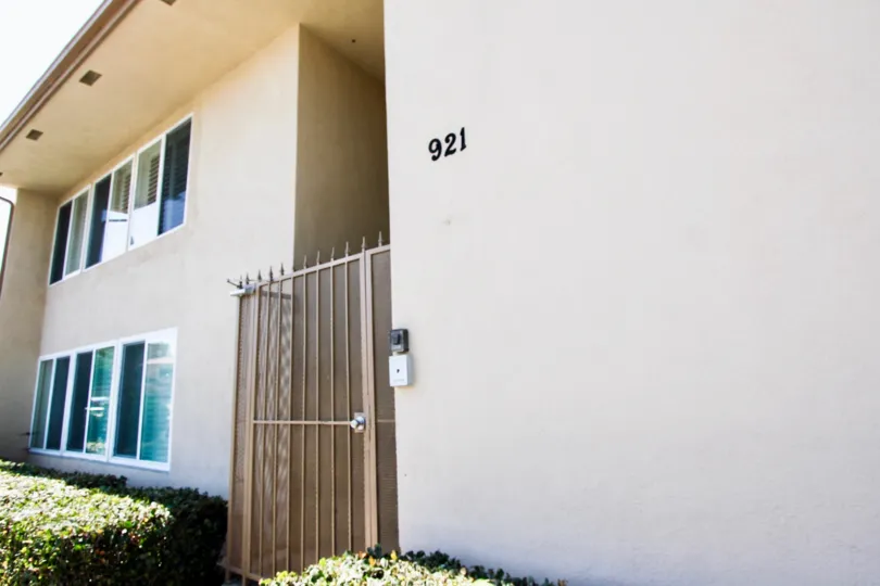The gate entrance into 921 Pacific Ave in Long Beach, California