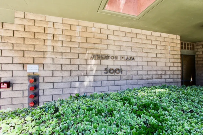The name of Atherton Plaza on the building in Long Beach, California