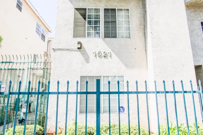 The address for Atrium Courts on the building in Long Beach, California