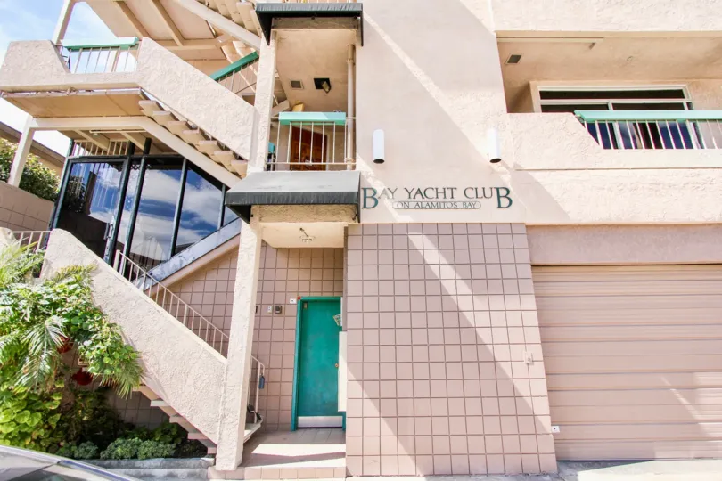 The name of the Bay Yacht Club written on the building