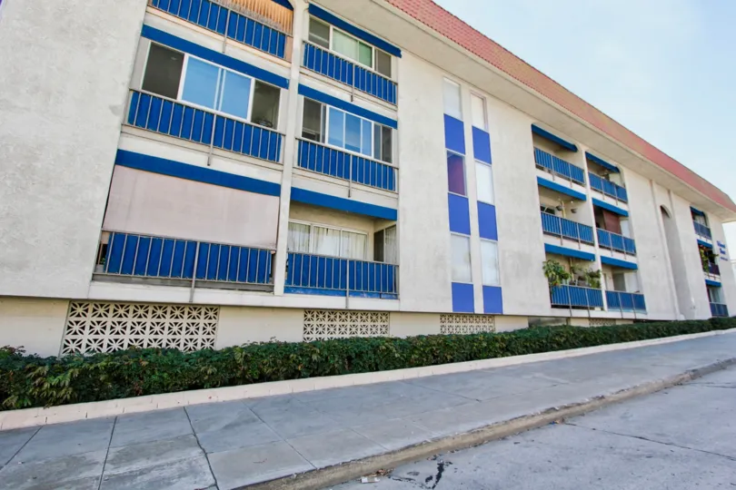 The blue décor on the Belmont Shore Condominiums building