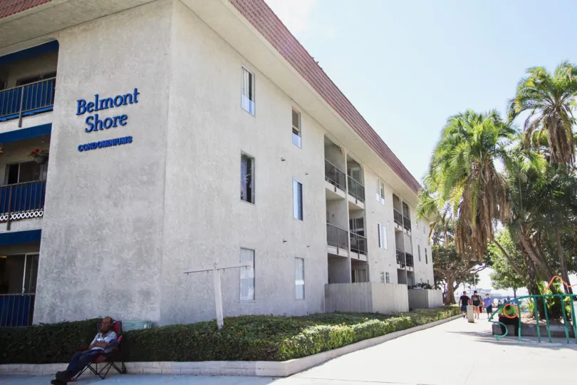 The sidewalk in front of Belmont Shore Condominiums