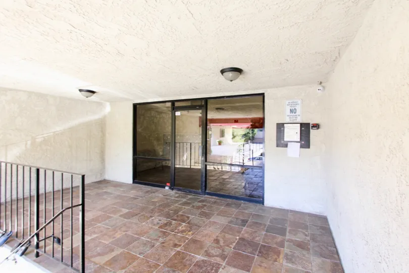 The entrance into Bixby Elm Condominiums