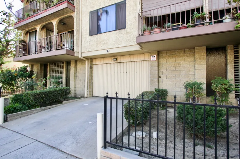 The iron fence around the property at Bixby Terrace