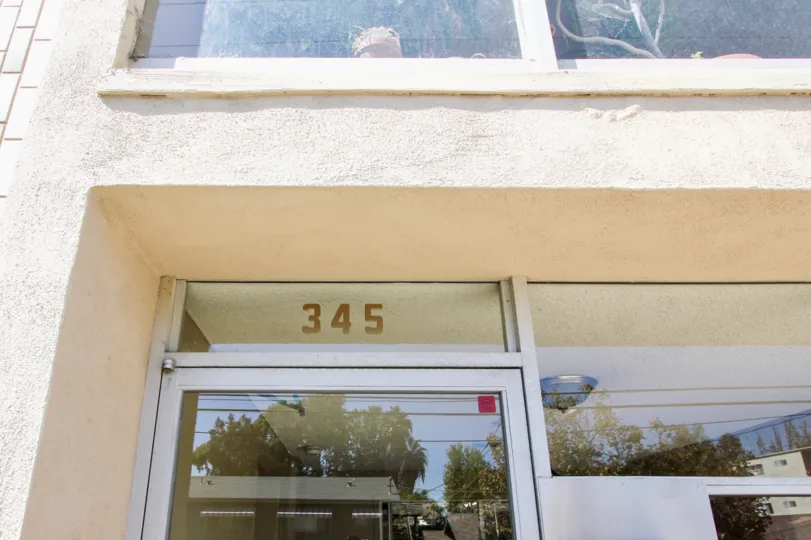 The address above the entrance into Carroll Park Plaza