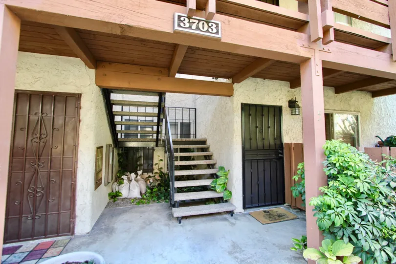 The address above the entryway into County Club Villas