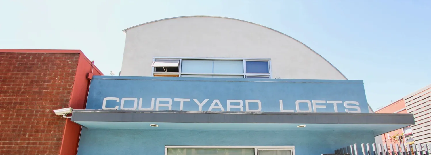 The Courtyard Lofts name above the entrance