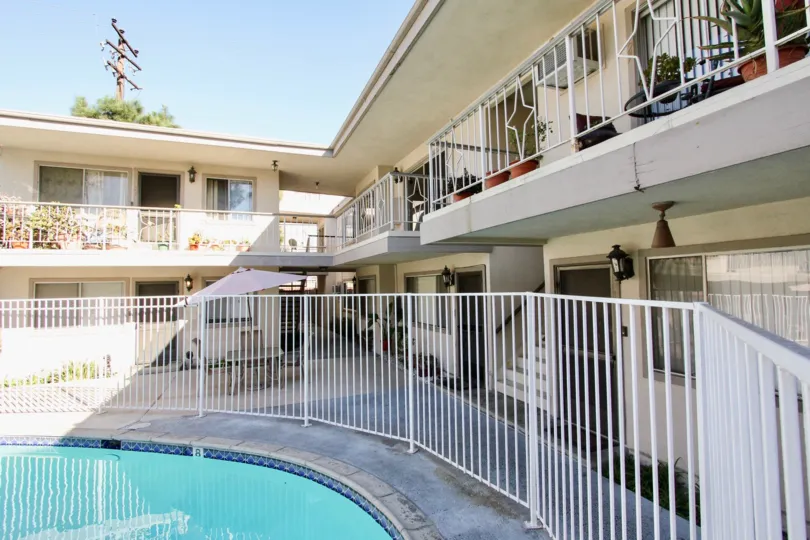 The fence around the Elmwood Villas pool