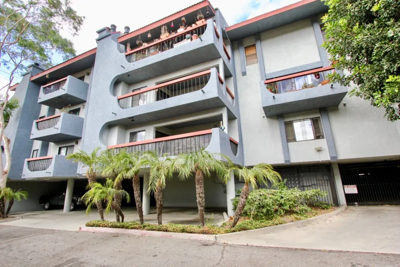 Balconies for apartments to one side of the secure entrance for an apartment building in Loma Linda, Long Beach, California.